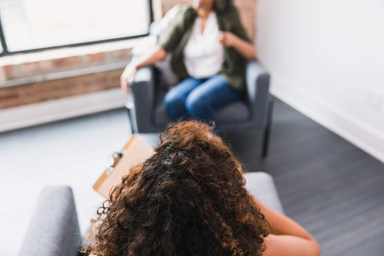 Counselor gives advice to patient